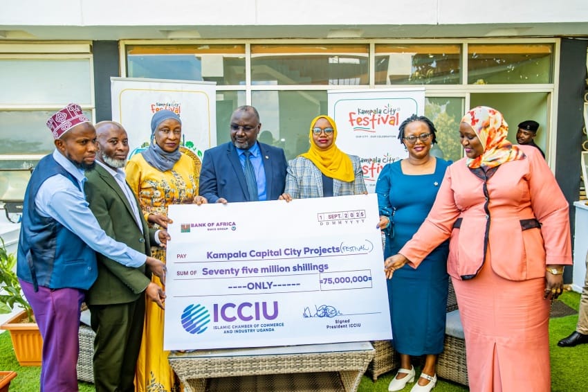 ICCIU presenting a 75 million shilling cheque to Kampala Capital City Projects at the Halal Village Expo partnership
