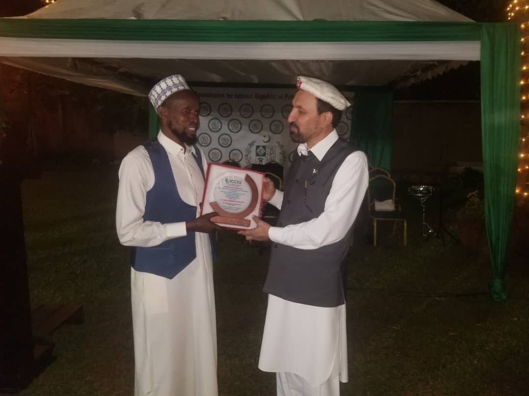 ICCIU recognition plaque presented at a diplomatic reception